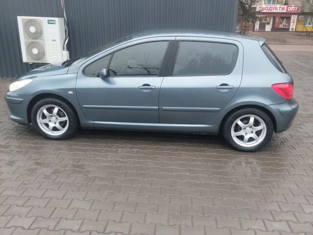 Серый Пежо 307, объемом двигателя 1.6 л и пробегом 244 тыс. км за 5600 $, фото 11 на Automoto.ua