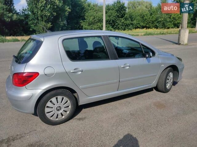 Серый Пежо 307, объемом двигателя 2 л и пробегом 233 тыс. км за 4199 $, фото 4 на Automoto.ua