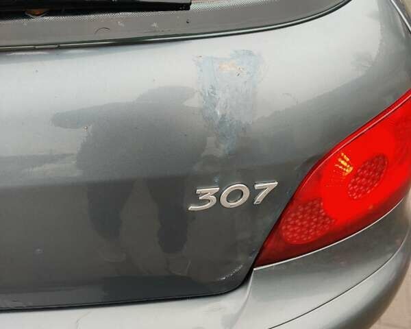 Серый Пежо 307, объемом двигателя 1.6 л и пробегом 300 тыс. км за 3400 $, фото 7 на Automoto.ua