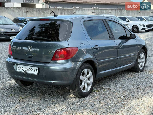 Сірий Пежо 307, об'ємом двигуна 1.56 л та пробігом 272 тис. км за 4200 $, фото 5 на Automoto.ua