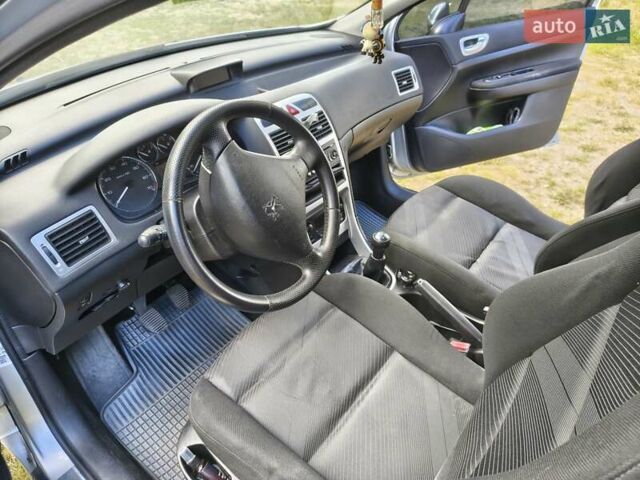 Серый Пежо 307, объемом двигателя 2 л и пробегом 185 тыс. км за 4400 $, фото 34 на Automoto.ua