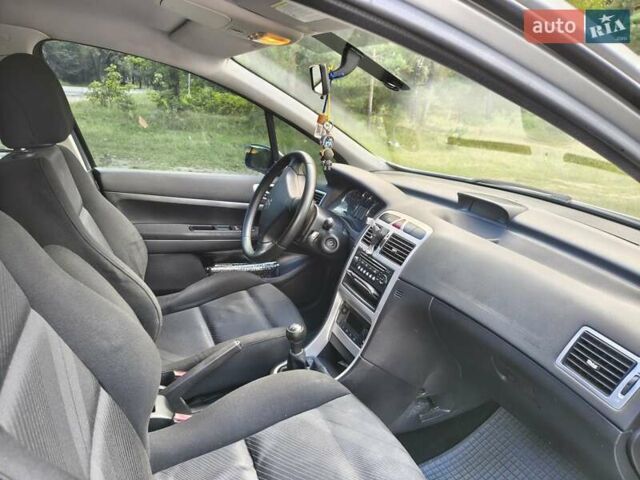 Серый Пежо 307, объемом двигателя 2 л и пробегом 185 тыс. км за 4400 $, фото 30 на Automoto.ua