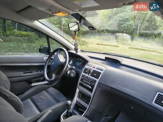 Серый Пежо 307, объемом двигателя 2 л и пробегом 185 тыс. км за 4400 $, фото 29 на Automoto.ua