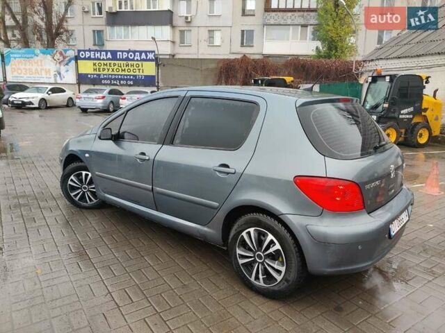 Серый Пежо 307, объемом двигателя 1.6 л и пробегом 300 тыс. км за 3400 $, фото 1 на Automoto.ua