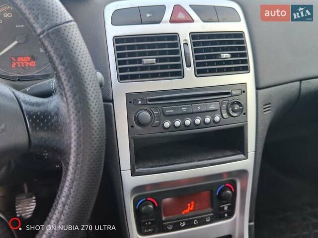 Серый Пежо 307, объемом двигателя 2 л и пробегом 277 тыс. км за 3600 $, фото 2 на Automoto.ua