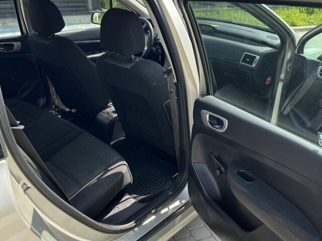 Серый Пежо 307, объемом двигателя 1.6 л и пробегом 208 тыс. км за 3900 $, фото 9 на Automoto.ua