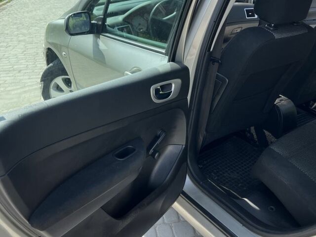 Серый Пежо 307, объемом двигателя 1.6 л и пробегом 208 тыс. км за 3900 $, фото 11 на Automoto.ua