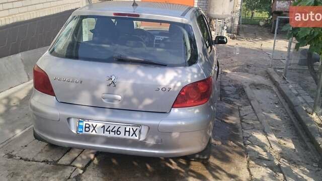 Серый Пежо 307, объемом двигателя 2 л и пробегом 216 тыс. км за 4200 $, фото 2 на Automoto.ua