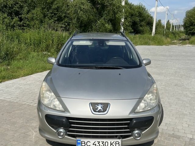 Серый Пежо 307, объемом двигателя 1.6 л и пробегом 208 тыс. км за 3900 $, фото 1 на Automoto.ua