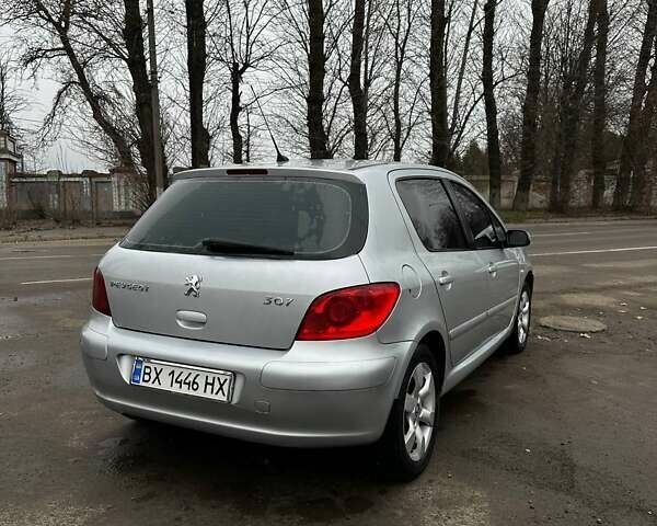 Серый Пежо 307, объемом двигателя 2 л и пробегом 220 тыс. км за 4900 $, фото 4 на Automoto.ua