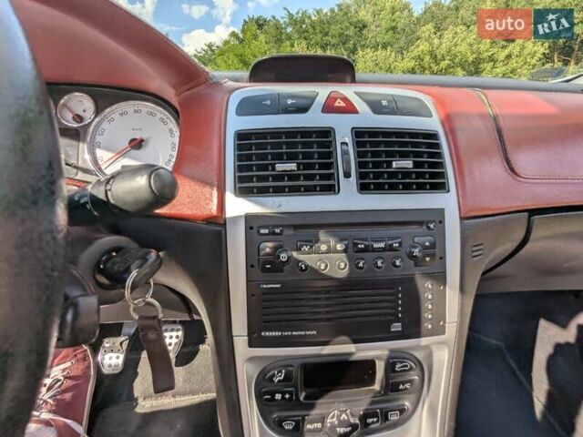 Серый Пежо 307, объемом двигателя 2 л и пробегом 176 тыс. км за 5200 $, фото 47 на Automoto.ua
