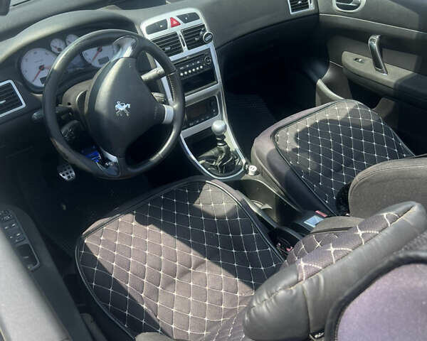 Серый Пежо 307, объемом двигателя 2 л и пробегом 239 тыс. км за 4000 $, фото 5 на Automoto.ua