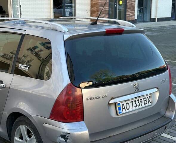 Сірий Пежо 307, об'ємом двигуна 2 л та пробігом 390 тис. км за 2300 $, фото 6 на Automoto.ua