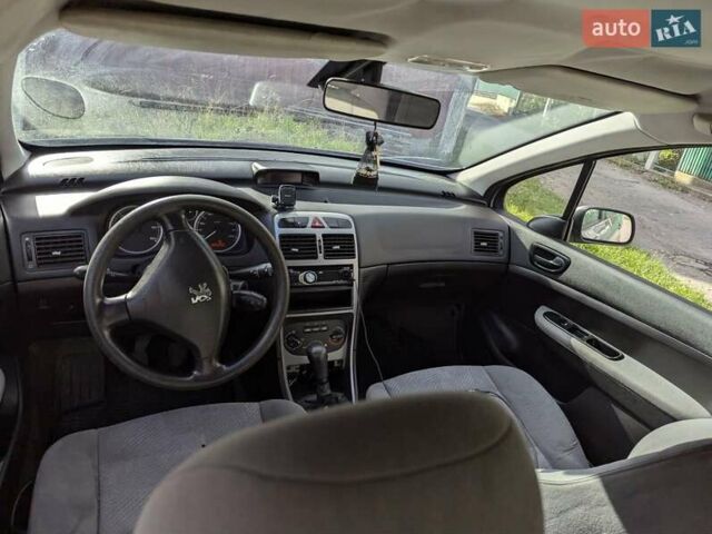 Серый Пежо 307, объемом двигателя 0 л и пробегом 393 тыс. км за 2599 $, фото 3 на Automoto.ua