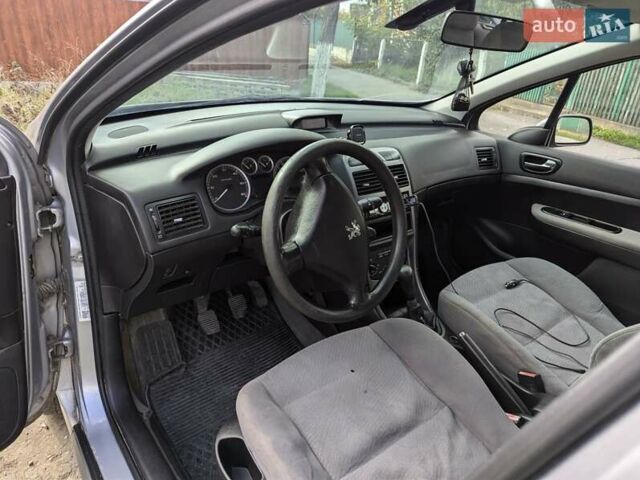 Серый Пежо 307, объемом двигателя 0 л и пробегом 393 тыс. км за 2599 $, фото 5 на Automoto.ua