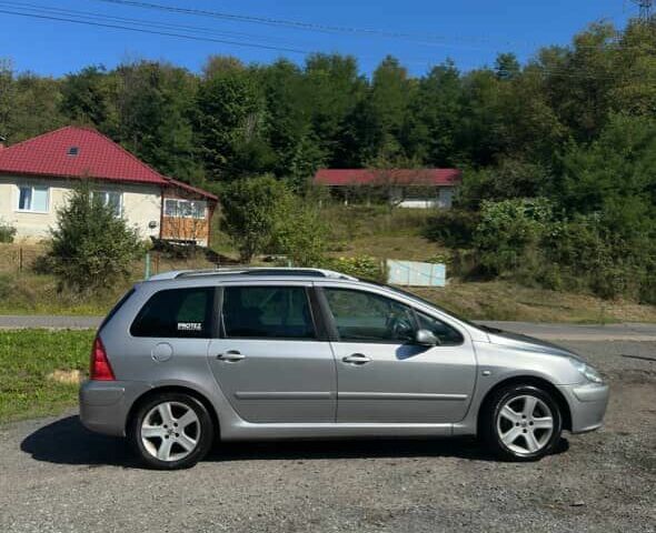 Сірий Пежо 307, об'ємом двигуна 2 л та пробігом 390 тис. км за 2300 $, фото 3 на Automoto.ua