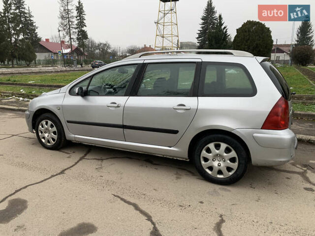 Сірий Пежо 307, об'ємом двигуна 1.59 л та пробігом 300 тис. км за 2000 $, фото 6 на Automoto.ua