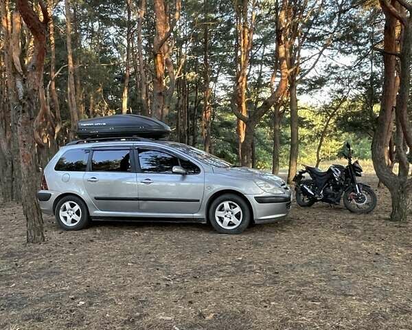 Серый Пежо 307, объемом двигателя 1.59 л и пробегом 192 тыс. км за 4500 $, фото 5 на Automoto.ua