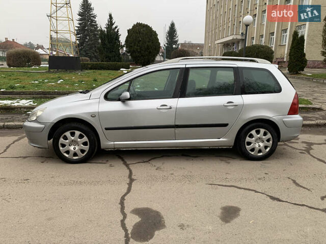 Сірий Пежо 307, об'ємом двигуна 1.59 л та пробігом 300 тис. км за 2000 $, фото 5 на Automoto.ua