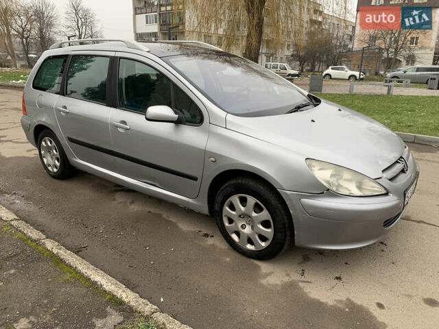 Сірий Пежо 307, об'ємом двигуна 1.59 л та пробігом 300 тис. км за 2000 $, фото 13 на Automoto.ua