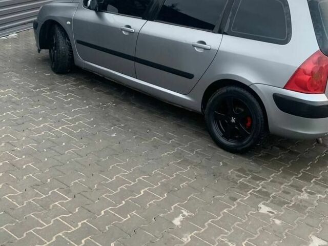 Серый Пежо 307, объемом двигателя 1.6 л и пробегом 333 тыс. км за 3300 $, фото 6 на Automoto.ua