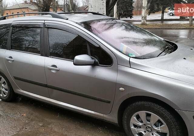 Серый Пежо 307, объемом двигателя 1.59 л и пробегом 192 тыс. км за 4500 $, фото 9 на Automoto.ua