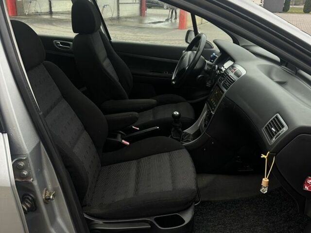 Серый Пежо 307, объемом двигателя 2 л и пробегом 179 тыс. км за 4200 $, фото 4 на Automoto.ua