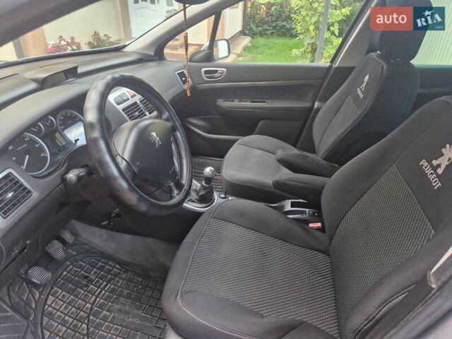 Сірий Пежо 307, об'ємом двигуна 2 л та пробігом 506 тис. км за 3900 $, фото 11 на Automoto.ua
