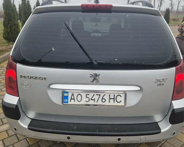 Серый Пежо 307, объемом двигателя 2 л и пробегом 241 тыс. км за 2476 $, фото 3 на Automoto.ua