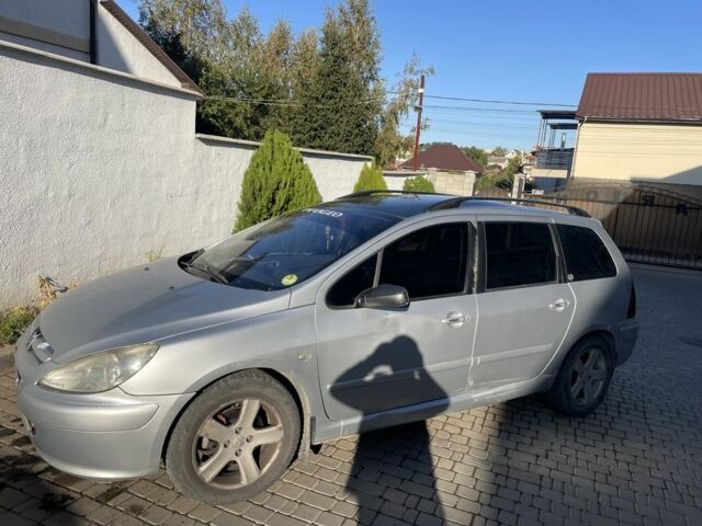 Сірий Пежо 307, об'ємом двигуна 2 л та пробігом 380 тис. км за 1750 $, фото 7 на Automoto.ua