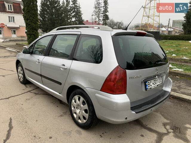 Сірий Пежо 307, об'ємом двигуна 1.59 л та пробігом 300 тис. км за 2000 $, фото 7 на Automoto.ua