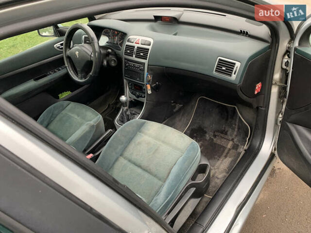 Сірий Пежо 307, об'ємом двигуна 1.59 л та пробігом 300 тис. км за 2000 $, фото 28 на Automoto.ua