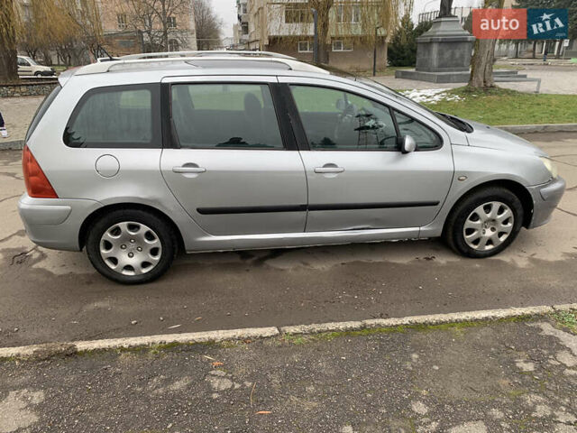 Сірий Пежо 307, об'ємом двигуна 1.59 л та пробігом 300 тис. км за 2000 $, фото 12 на Automoto.ua