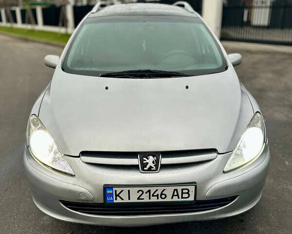 Серый Пежо 307, объемом двигателя 2 л и пробегом 249 тыс. км за 4450 $, фото 4 на Automoto.ua
