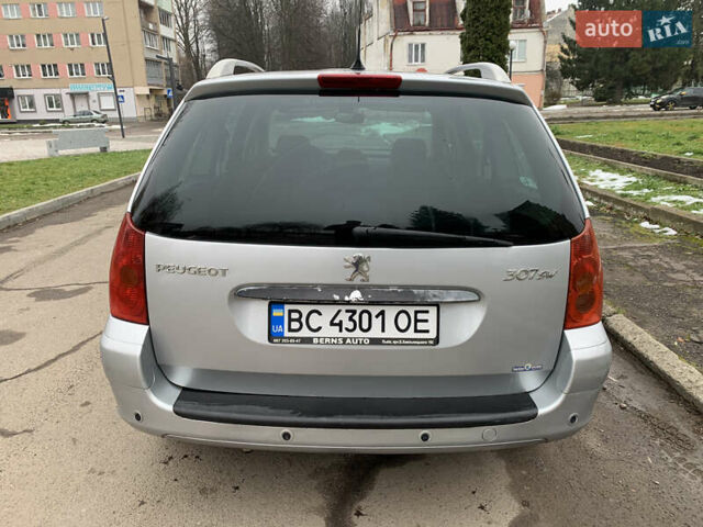 Сірий Пежо 307, об'ємом двигуна 1.59 л та пробігом 300 тис. км за 2000 $, фото 9 на Automoto.ua