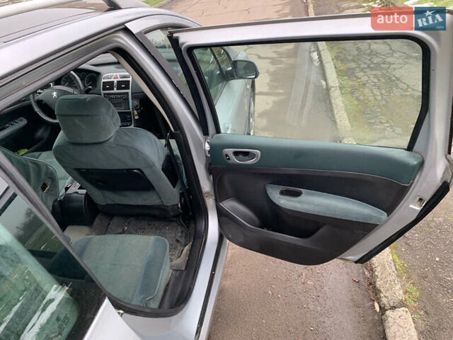 Сірий Пежо 307, об'ємом двигуна 1.59 л та пробігом 300 тис. км за 2000 $, фото 26 на Automoto.ua