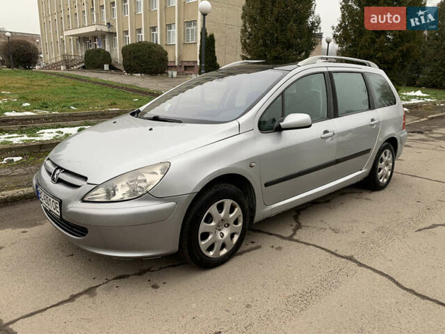 Сірий Пежо 307, об'ємом двигуна 1.59 л та пробігом 300 тис. км за 2000 $, фото 4 на Automoto.ua