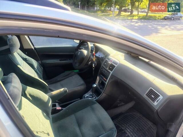 Серый Пежо 307, объемом двигателя 2 л и пробегом 320 тыс. км за 3000 $, фото 10 на Automoto.ua