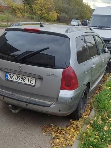 Сірий Пежо 307, об'ємом двигуна 2.01 л та пробігом 324 тис. км за 3000 $, фото 3 на Automoto.ua