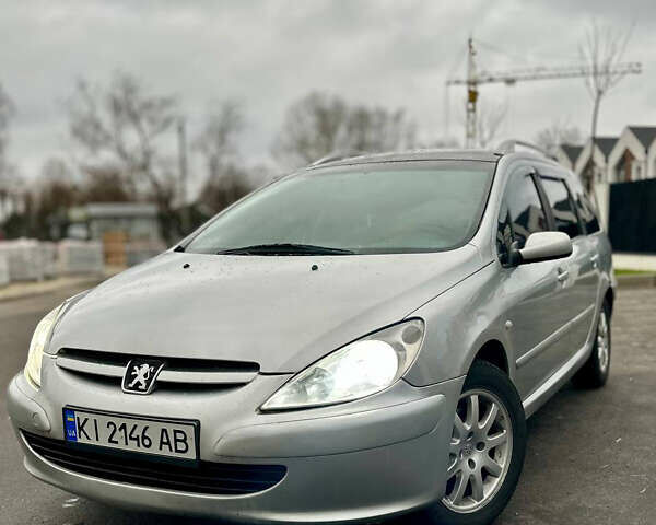 Серый Пежо 307, объемом двигателя 2 л и пробегом 249 тыс. км за 4450 $, фото 2 на Automoto.ua