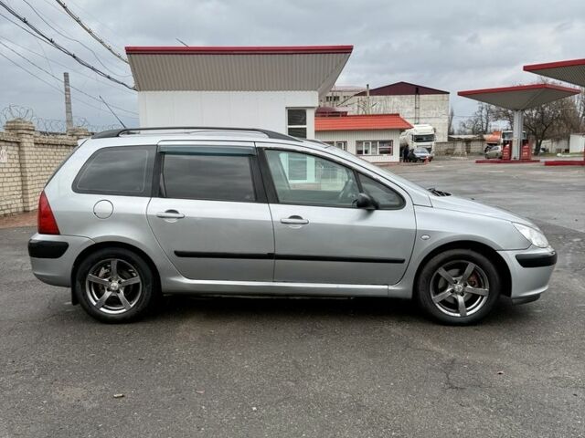 Серый Пежо 307, объемом двигателя 2 л и пробегом 400 тыс. км за 3500 $, фото 4 на Automoto.ua