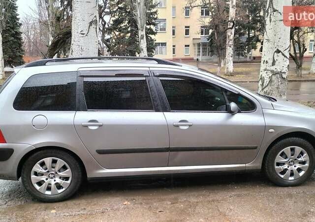 Серый Пежо 307, объемом двигателя 1.59 л и пробегом 192 тыс. км за 4500 $, фото 6 на Automoto.ua