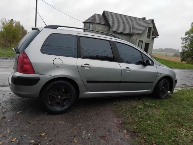 Серый Пежо 307, объемом двигателя 1.6 л и пробегом 333 тыс. км за 3300 $, фото 7 на Automoto.ua