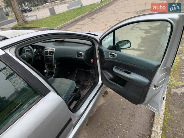 Сірий Пежо 307, об'ємом двигуна 1.59 л та пробігом 300 тис. км за 2000 $, фото 29 на Automoto.ua