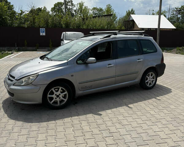 Сірий Пежо 307, об'ємом двигуна 2 л та пробігом 395 тис. км за 2700 $, фото 5 на Automoto.ua