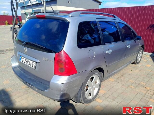 Серый Пежо 307, объемом двигателя 2 л и пробегом 200 тыс. км за 2800 $, фото 5 на Automoto.ua