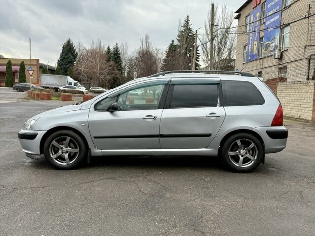 Серый Пежо 307, объемом двигателя 2 л и пробегом 400 тыс. км за 3500 $, фото 1 на Automoto.ua