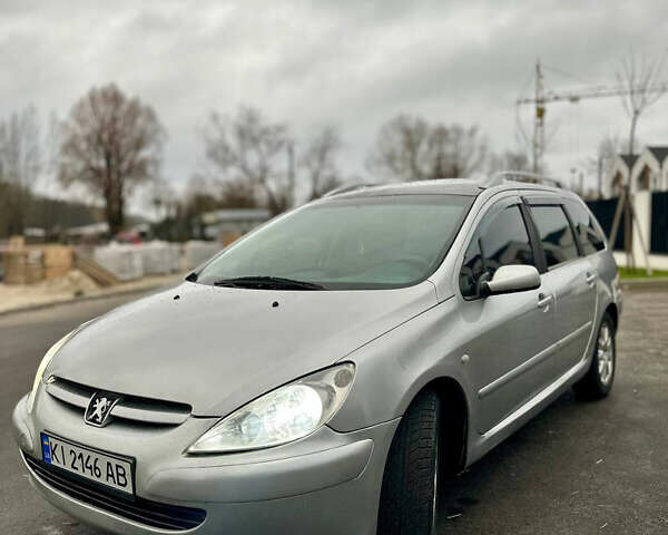 Серый Пежо 307, объемом двигателя 2 л и пробегом 249 тыс. км за 4450 $, фото 5 на Automoto.ua