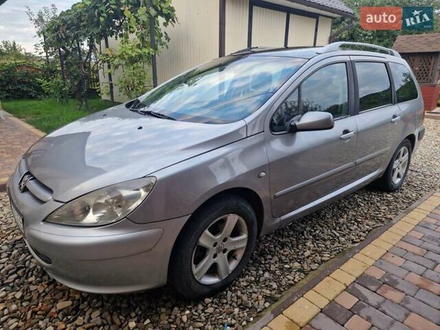 Сірий Пежо 307, об'ємом двигуна 2 л та пробігом 506 тис. км за 3900 $, фото 9 на Automoto.ua