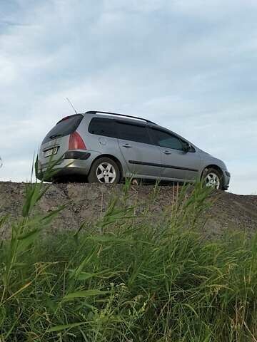 Серый Пежо 307, объемом двигателя 1.59 л и пробегом 192 тыс. км за 4500 $, фото 13 на Automoto.ua